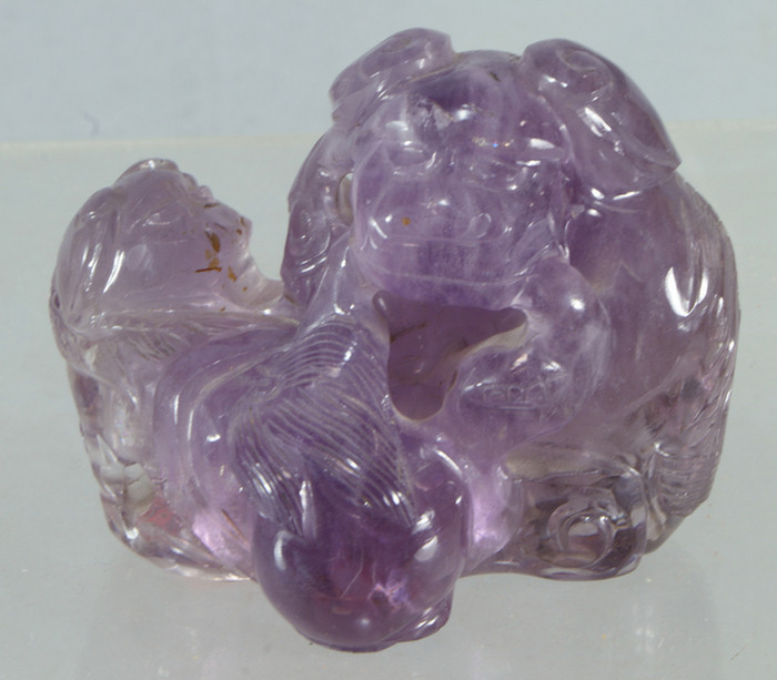 Appraisal: Chinese carved amethyst quartz of dogs playing with a ball