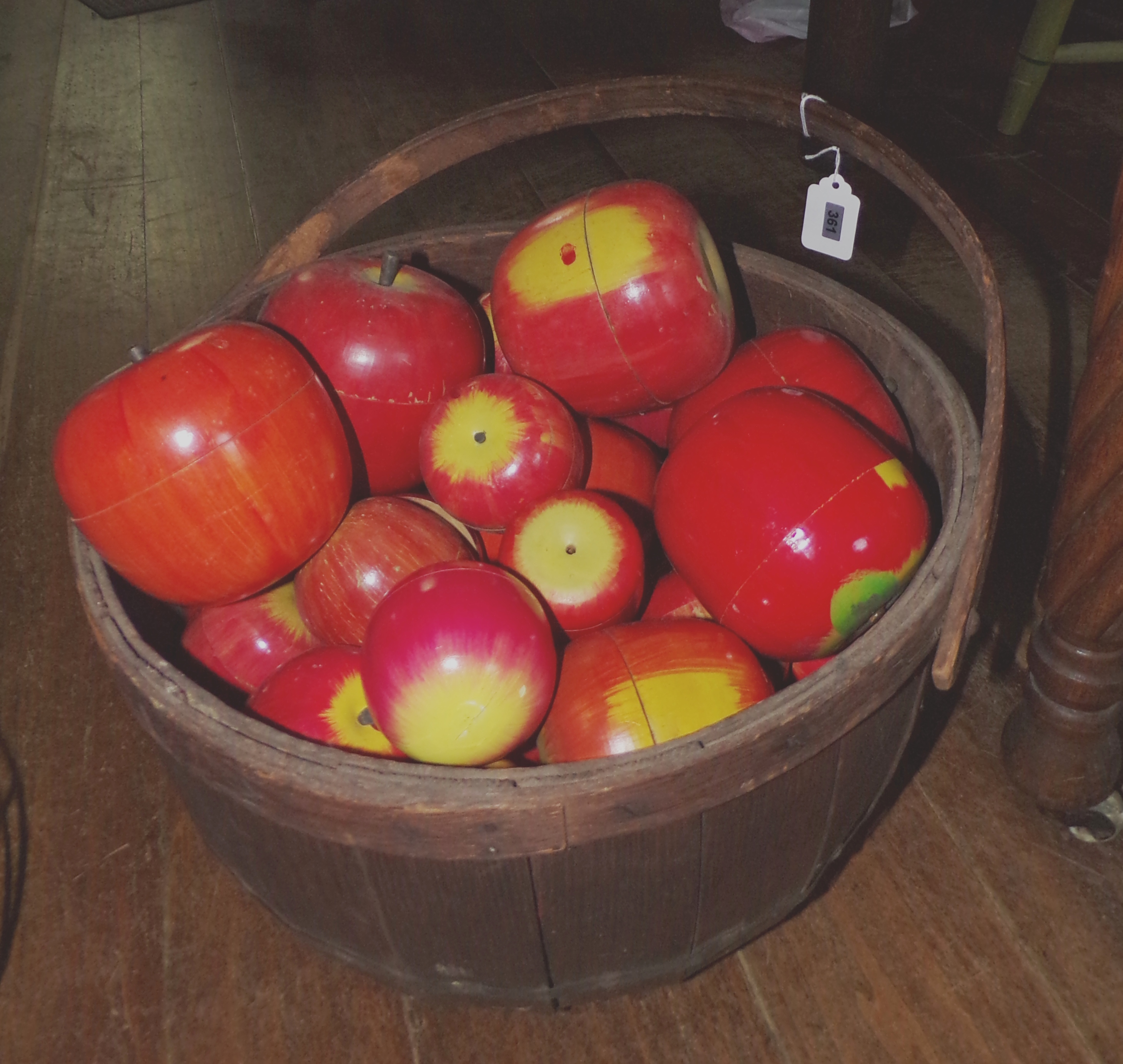 Appraisal: Splint handle basket with approximately Shenandoah wood apples