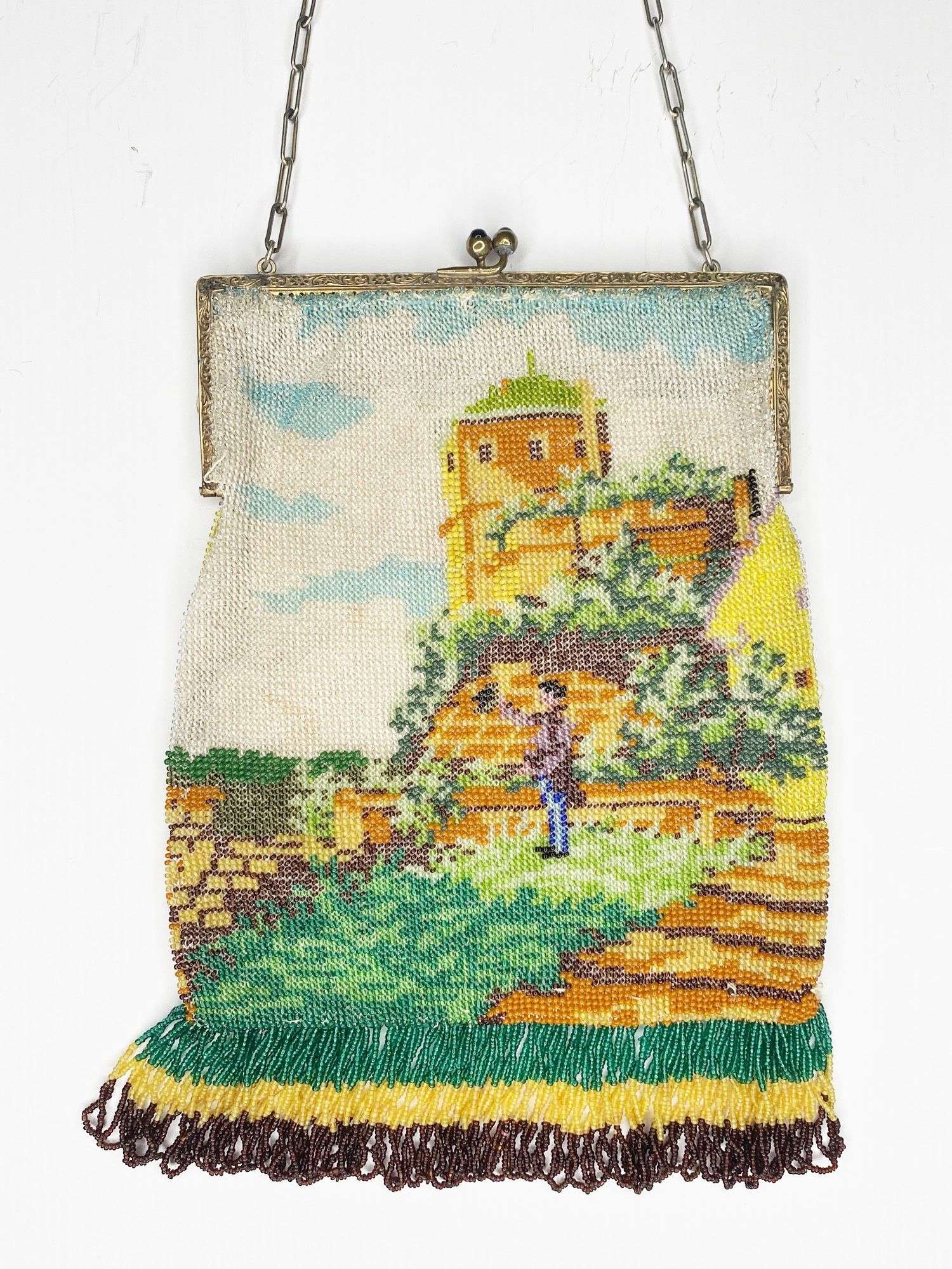 Appraisal: Micro Beaded Hand Bag with Man in Garden long at