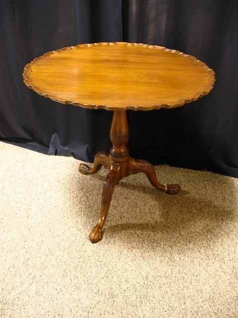 Appraisal: CHIPPENDALE MAHOGANY PIECRUST TEA TABLE Probably English th century with