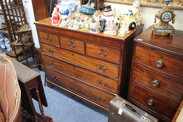 Appraisal: A MAHOGANY KNEEHOLE WRITING DESK fitted five drawers cm wide