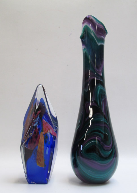 Appraisal: TWO ART GLASS SCULPTURES A pointed shaped sculpture with colorful