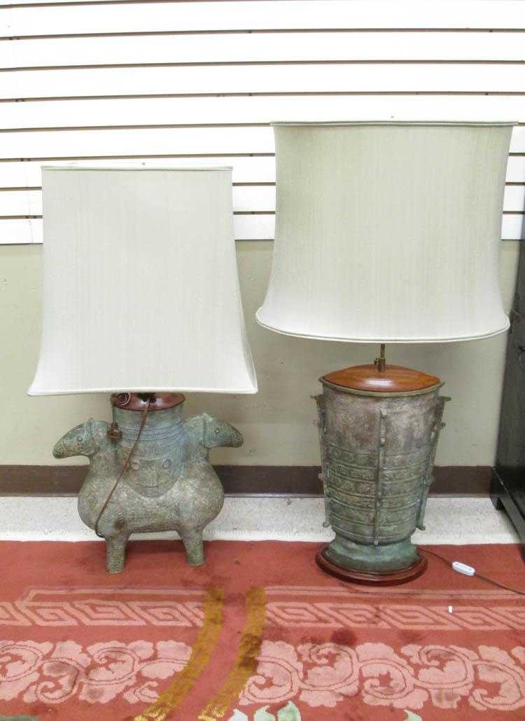 Appraisal: TWO CHINESE ARCHAIC STYLE TABLE LAMPS with patinated bronze bodies