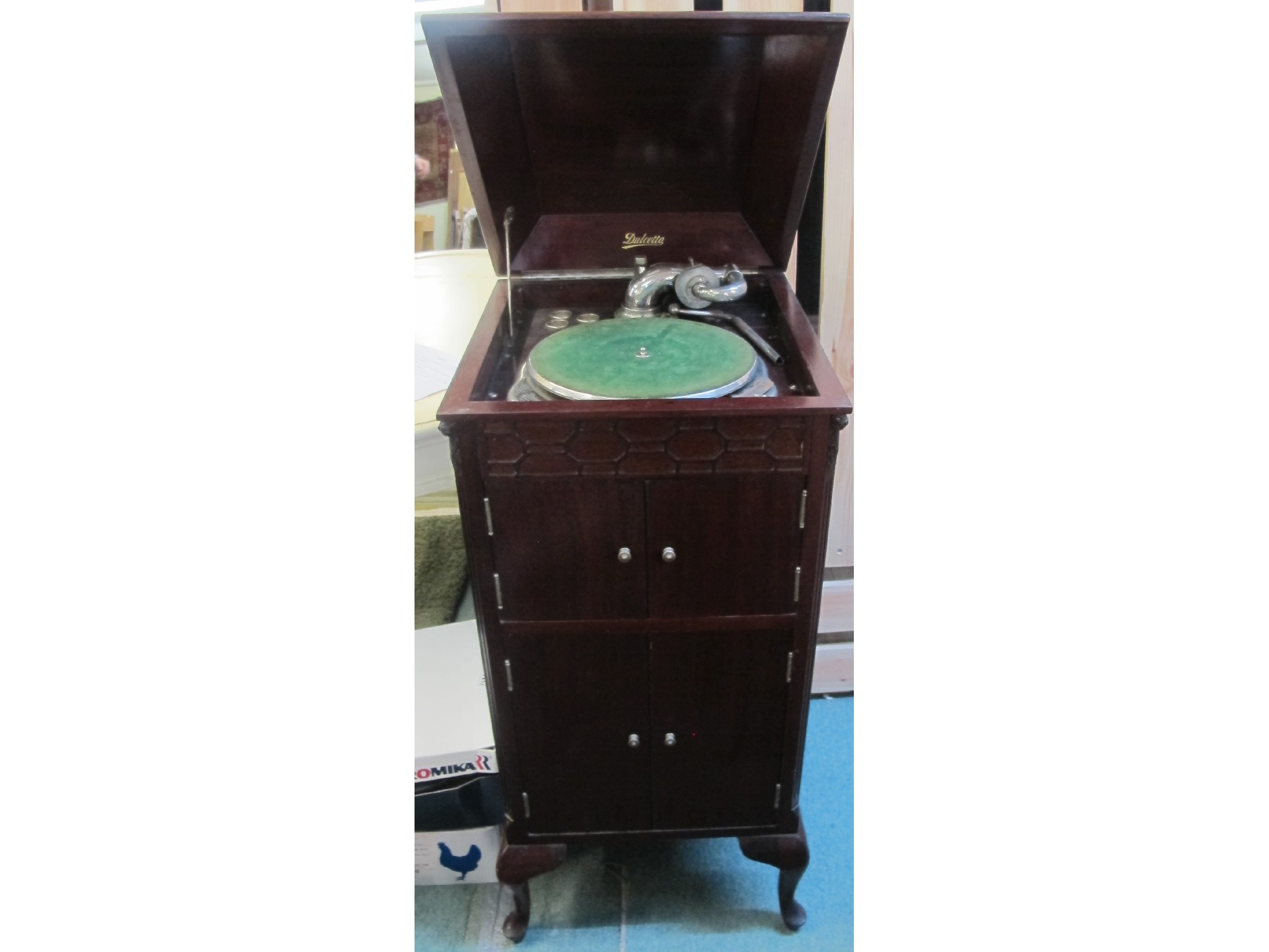 Appraisal: Dulcetto mahogany cased gramophone with two boxes of records