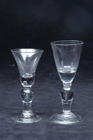 Appraisal: AN ENGLISH BALUSTER WINE GLASS with teardrop stem and domed