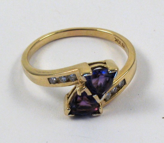 Appraisal: AMETHYST DIAMOND AND TEN KARAT GOLD RING set with two