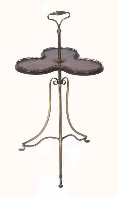 Appraisal: A VICTORIAN MAHOGANY AND BRASS CAKE STAND with carrying handle