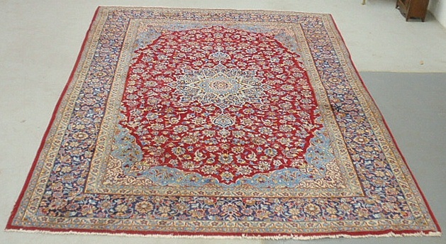 Appraisal: - Room size Kashan oriental carpet with floral patterns and