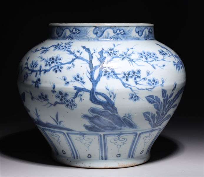 Appraisal: Chinese blue and white porcelain vase with trees and flowers