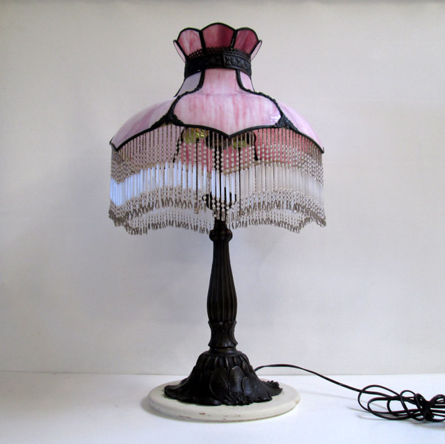 Appraisal: PINK SLAG GLASS TABLE LAMP having panel construction and beaded