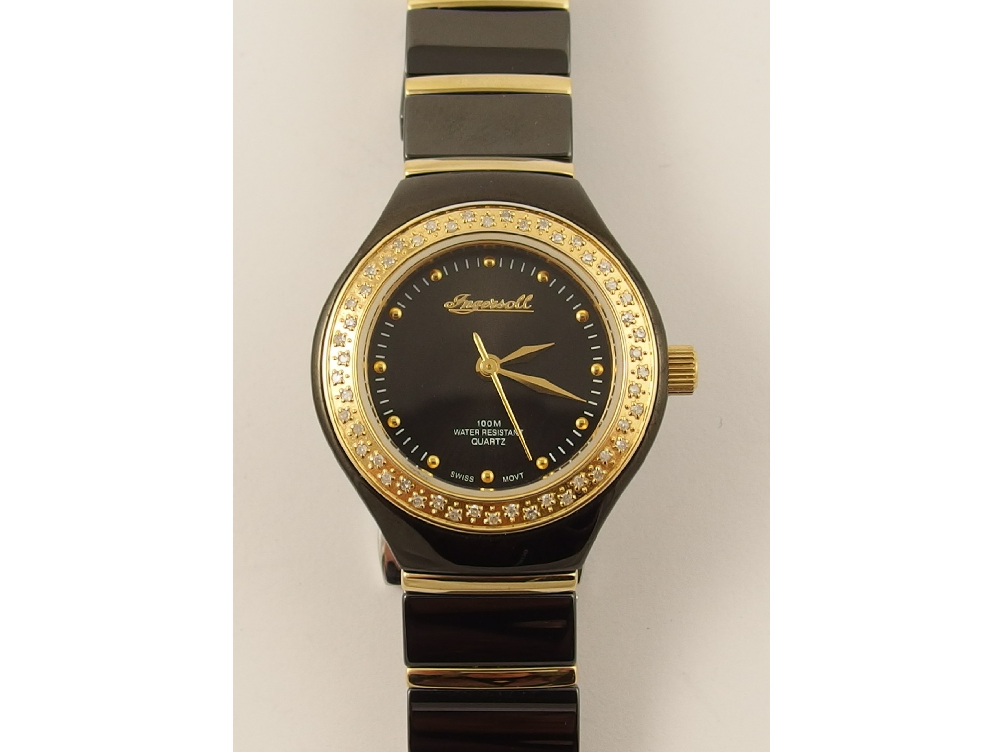 Appraisal: A ladies Ingersoll ceramic and diamond set watch