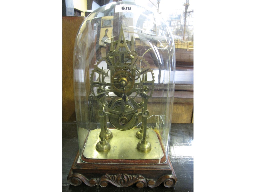 Appraisal: Brass skeleton clock under glass dome