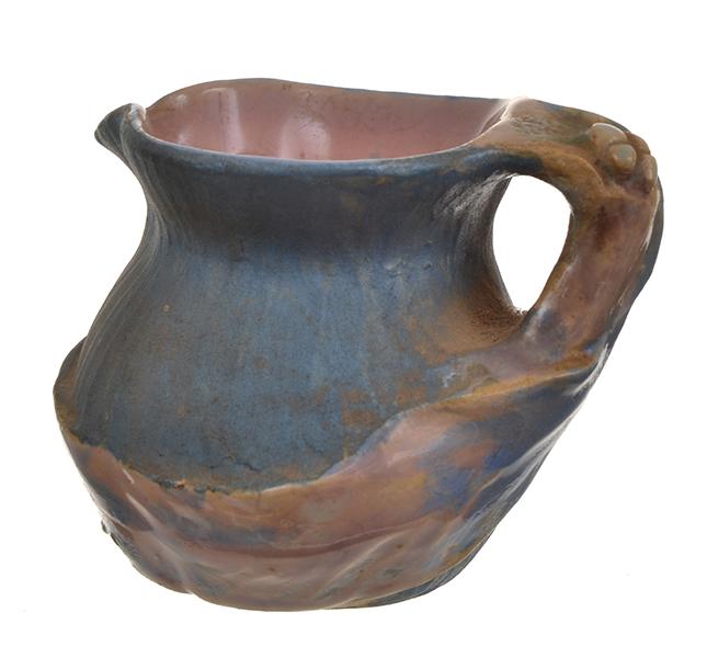 Appraisal: PHILIPPA JAMES MINIATURE JUG WITH APPLIED LEAF