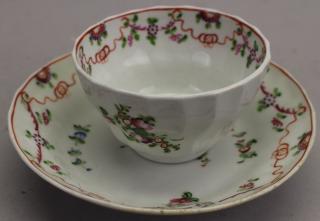 Appraisal: Antique Porcelain Cup Saucer with floral decoration throughout Cup Height