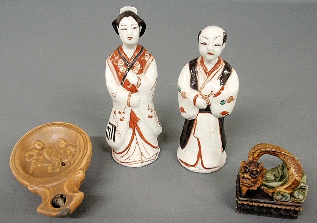 Appraisal: - Two Chinese porcelain figures h a dragon handled stamp