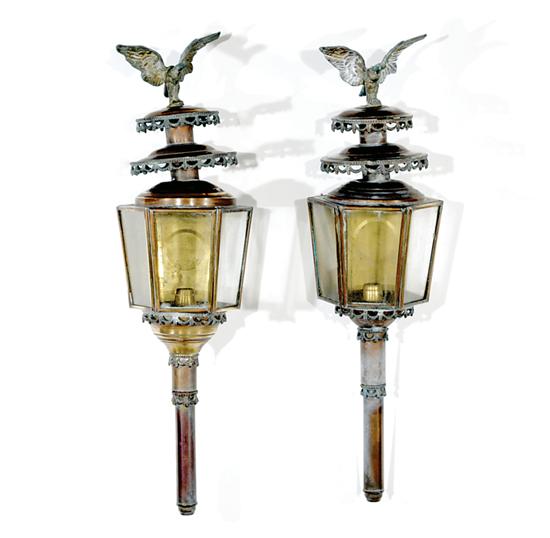 Appraisal: Pair brass lanterns early th century eagle finial over tiered