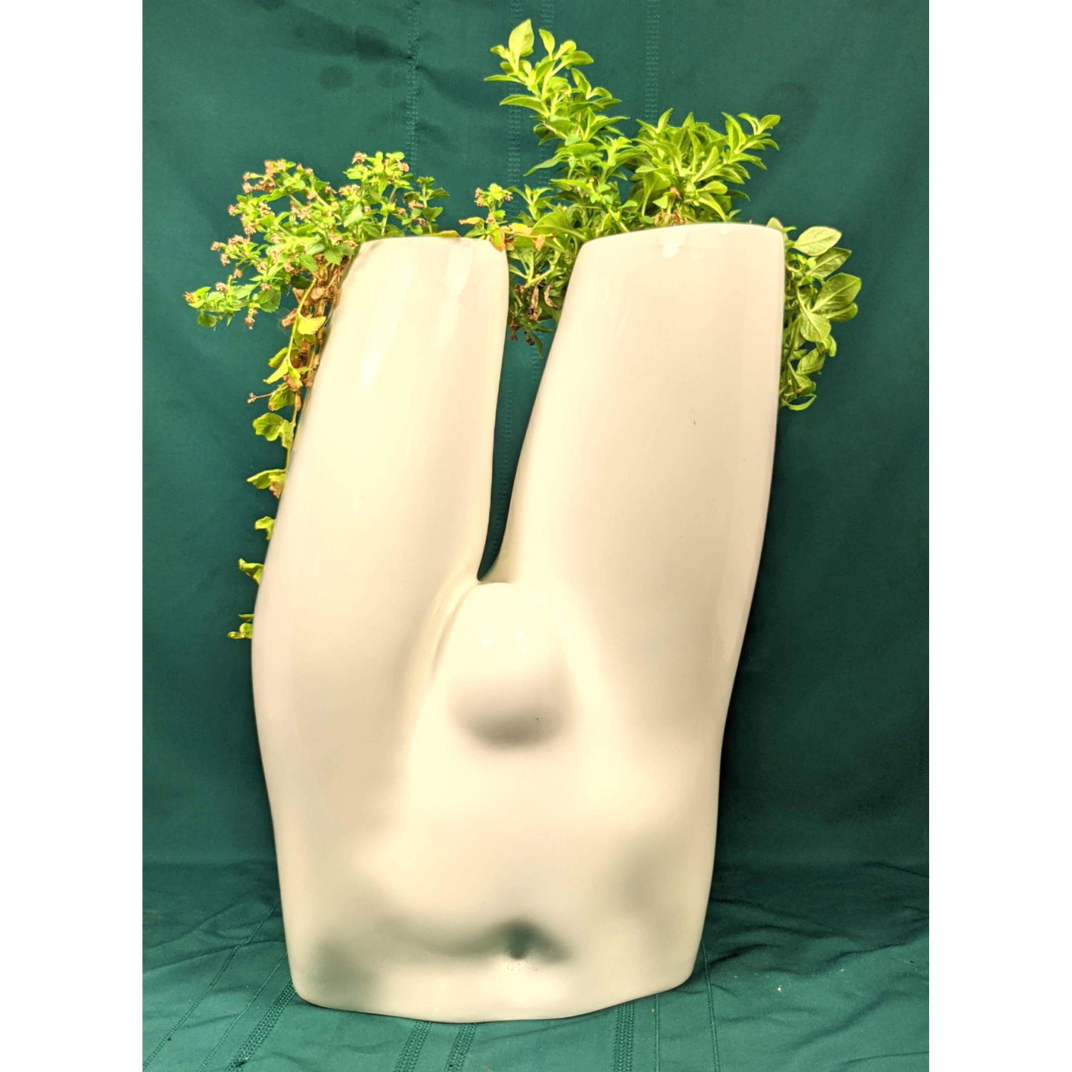 Appraisal: Decorator Lower Torso Resin Planter Plants have died since pictured