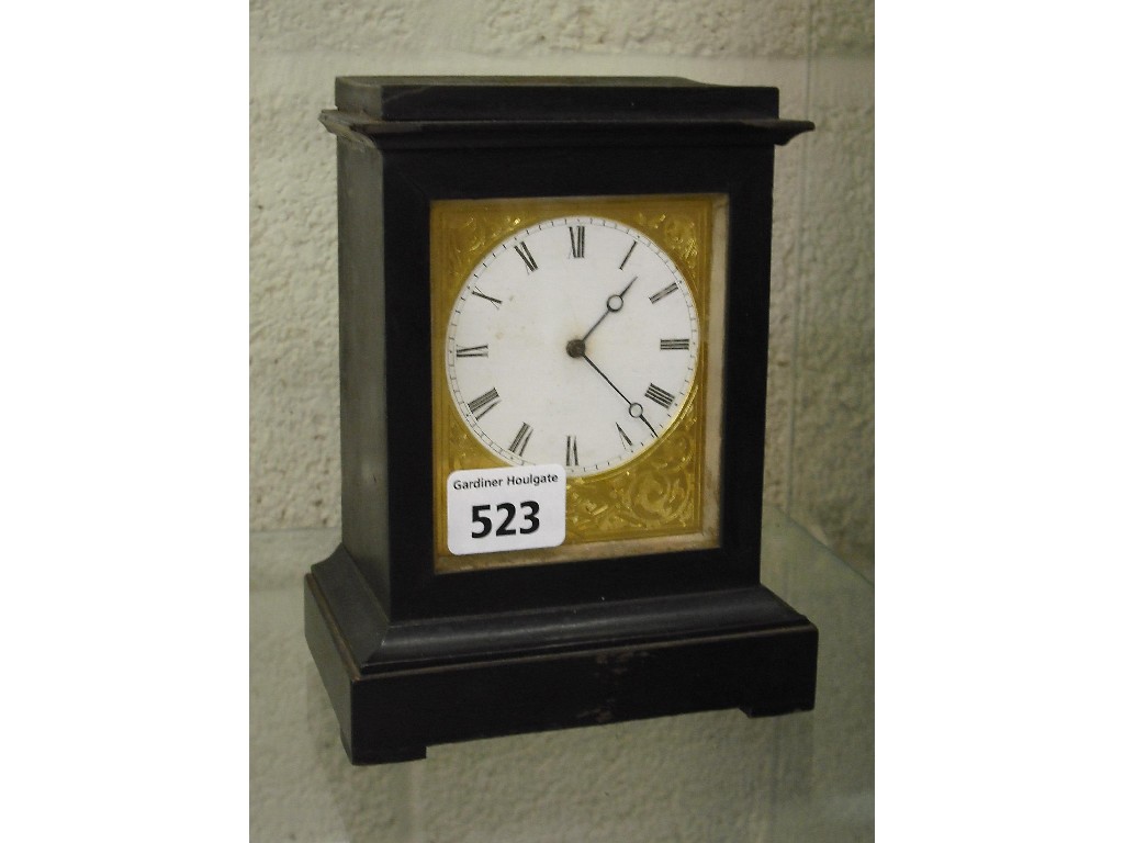 Appraisal: Small ebonised single fusee mantel clock the white dial within