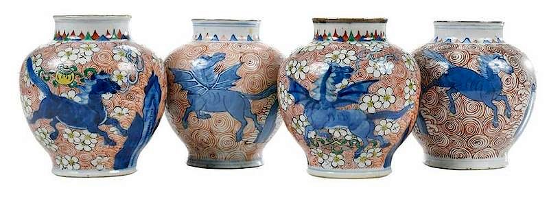 Appraisal: Four Chinese Dragon Horse Vases similar design of blue horses