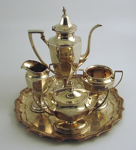 Appraisal: Octagonal section urn finials consisting of coffee pot by Wallace