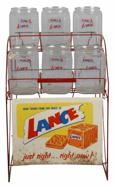 Appraisal: Lance Display Rack with Bottles Description Original Lance labels on