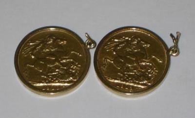 Appraisal: TWO GOLD SOVEREIGNS dated and in plain ct gold surrounds