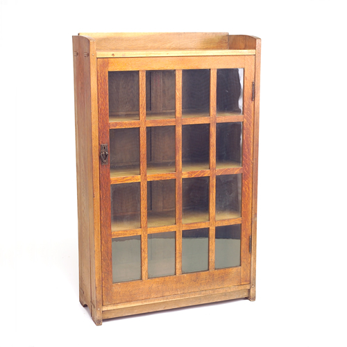 Appraisal: GUSTAV STICKLEY Single door bookcase with sixteen panes gallery top