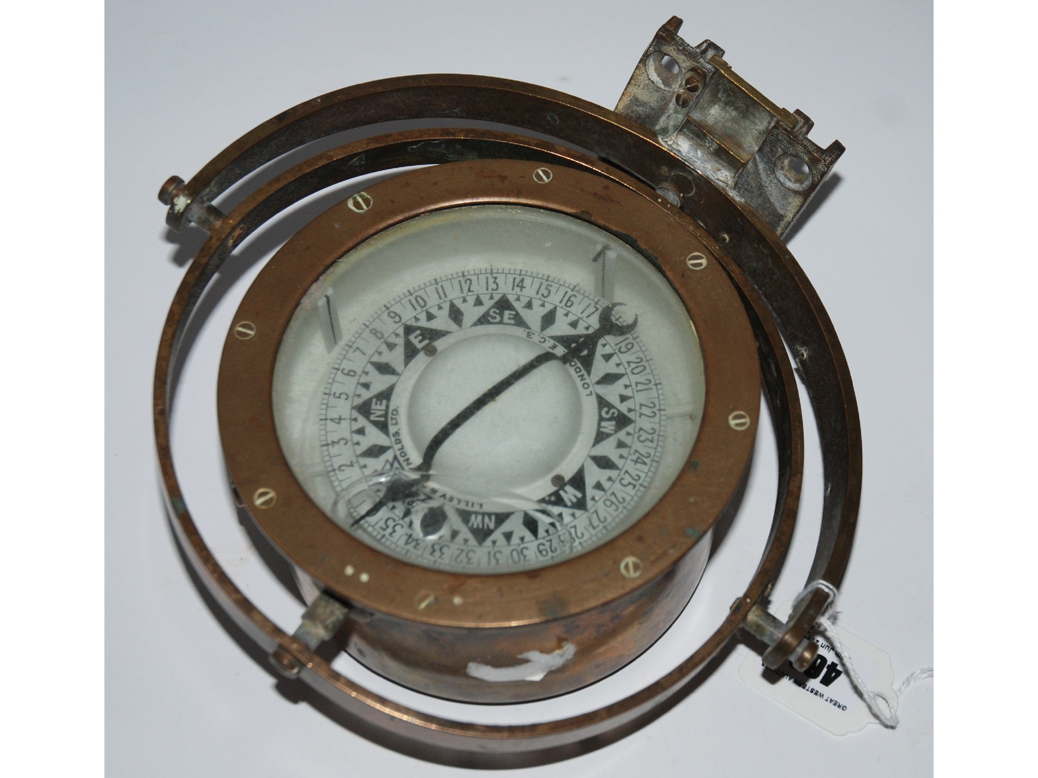 Appraisal: A brass cased Lilley Reynolds Ltd gimble compass