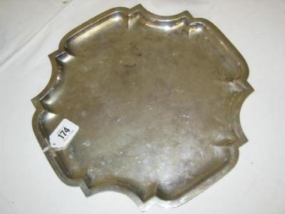 Appraisal: AN EDWARDIAN TEA TRAY of cartouche form with moulded rim