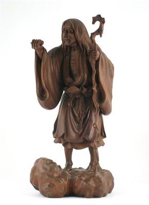 Appraisal: A large Japanese wood carving of Gama-Sennin the god stands