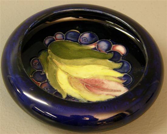 Appraisal: Small Moorcroft dish decorated with a leaf and berries on