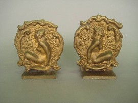 Appraisal: NORMAN LINDSAY ORIGINAL BOOKENDS Original sculpted plaster bookends used to