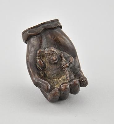 Appraisal: Hand of Creator Holding Shojo Wood Netsuke Depicting Hand of