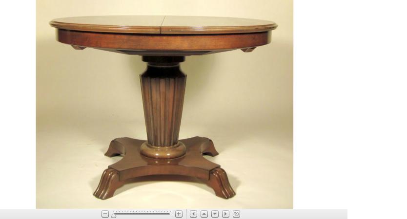 Appraisal: French maple side table The circular top with two leaves