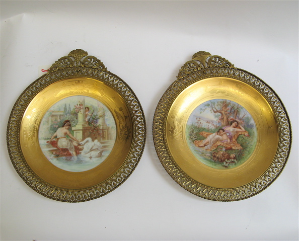 Appraisal: PAIR OSBORNE ART STUDIO FRAMED PLATES signed by artist Osborne