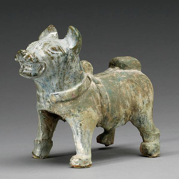 Appraisal: A green glazed pottery model of a dog Han Dynasty