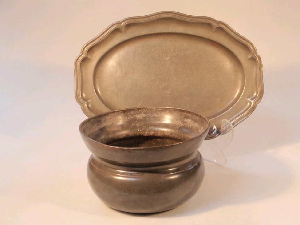 Appraisal: A mid thC pewter oval meat plate with touch marks