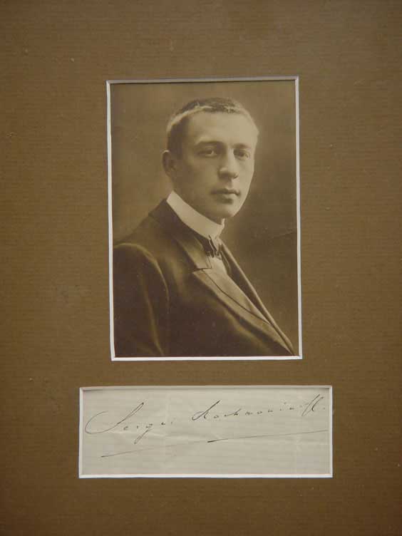 Appraisal: PHOTOGRAPH OF RACHMANINOFF Sepia toned photograph of Sergei Rachmaninoff with