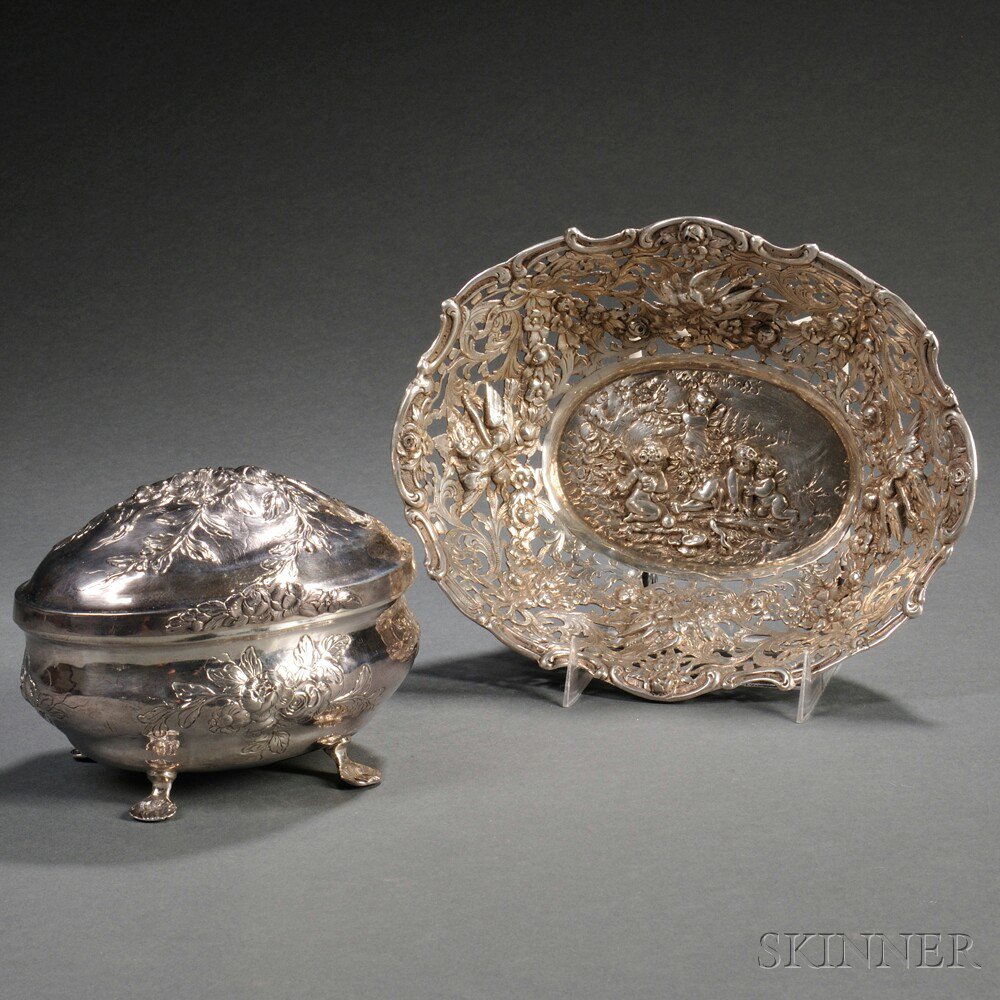 Appraisal: Two Pieces of German Repousse-decorated Silver Hollowware an oval covered