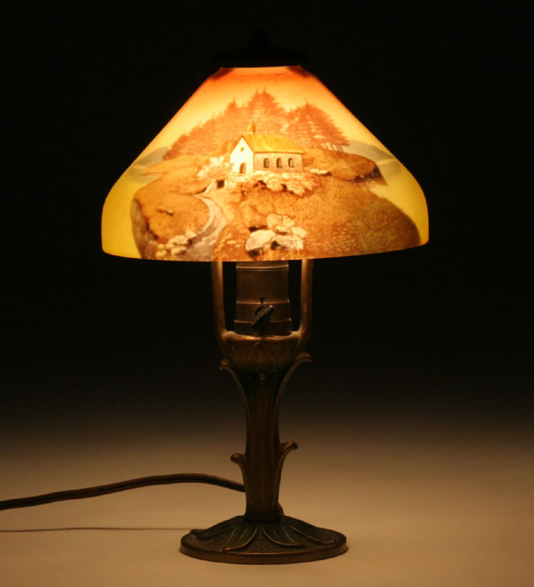 Appraisal: Reverse-painted boudoir lamp the interior of the shade painted with