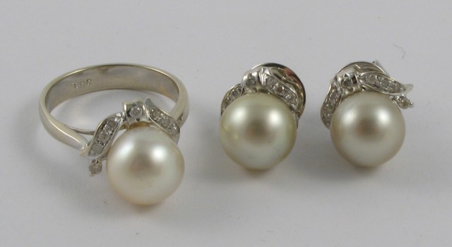 Appraisal: THREE ARTICLES OF PEARL JEWELRY Including a pearl diamond and