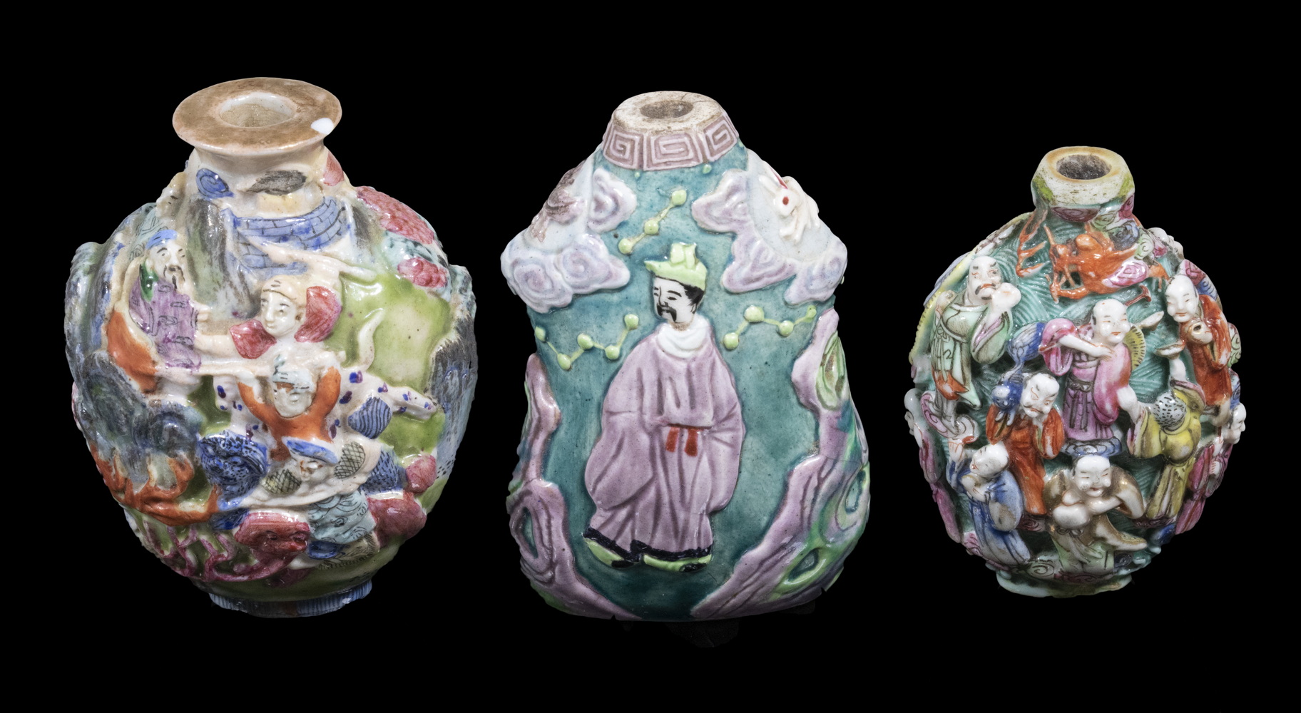 Appraisal: CHINESE PORCELAIN SNUFF BOTTLES Lot of Enameled Biscuit Relief Molded