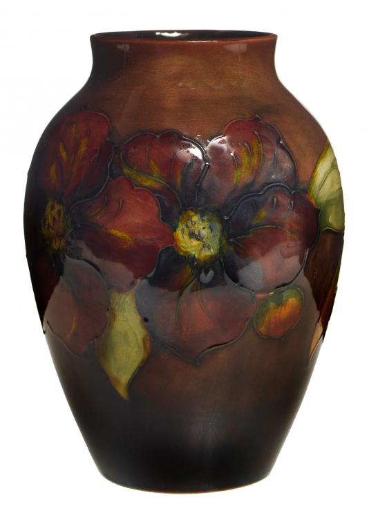 Appraisal: A MOORCROFT FLAMB CLEMATIS VASE DESIGNED BY WALTER MOORCROFT cm