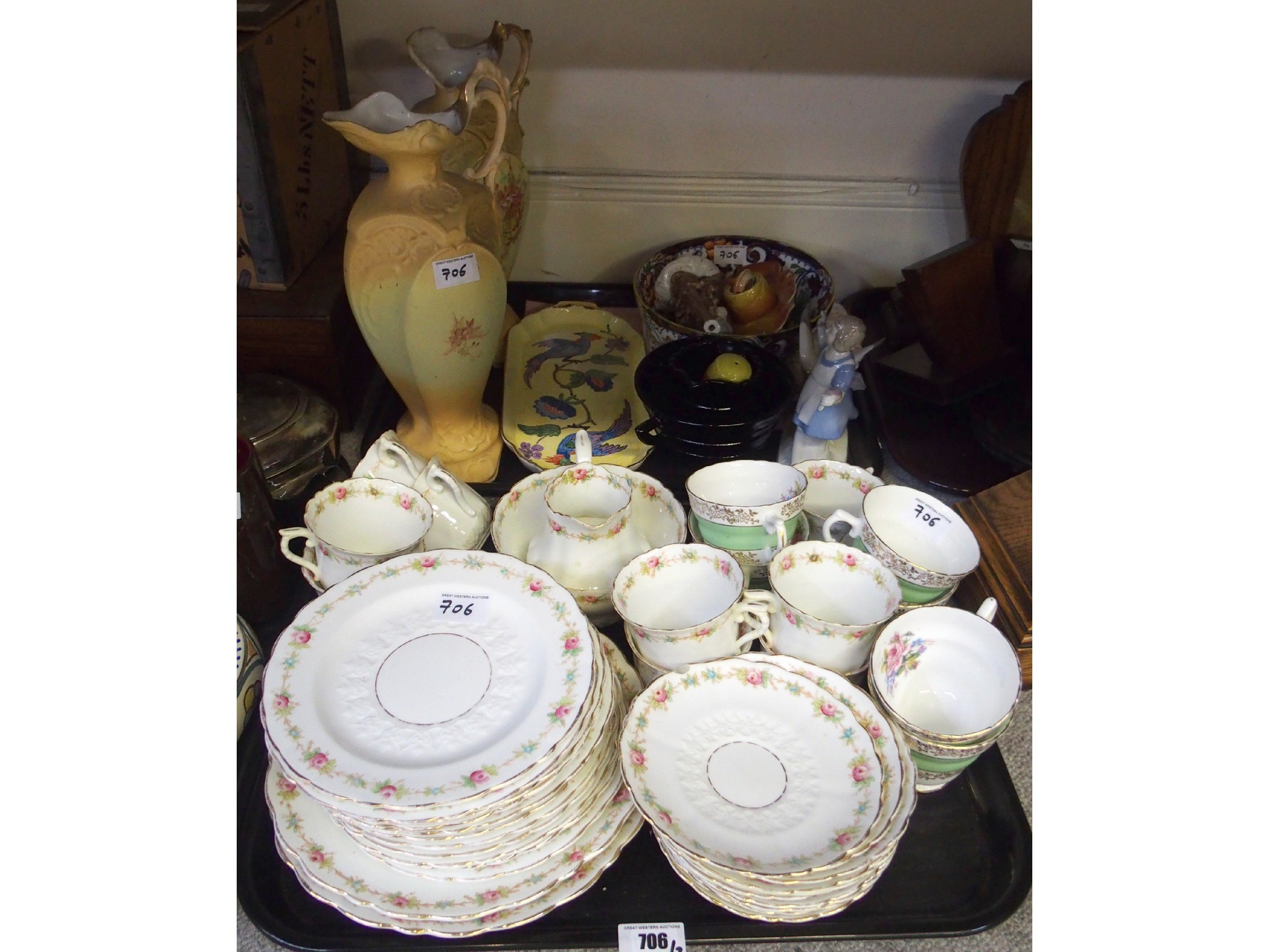 Appraisal: Two trays comprising Continental porcelain tea set pair of painted