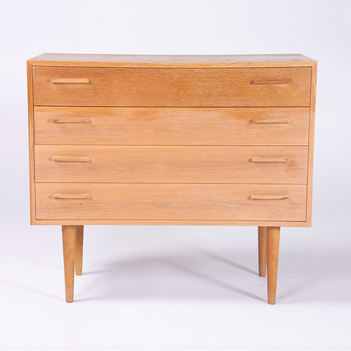 Appraisal: BORGE MOGENSEN Four-drawer dresser with horizontal pulls on tapering dowel