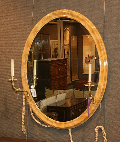 Appraisal: A Neoclassical style faux marble painted mirror mounted with gilt