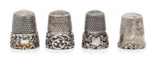 Appraisal: Four Silver Thimbles Various Makers comprising an example having a