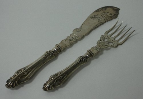 Appraisal: A pair of Victorian silver fish servers H T Birmingham