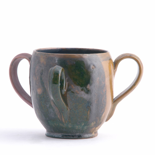 Appraisal: GEORGE OHR Loving cup covered in bands of amber indigo