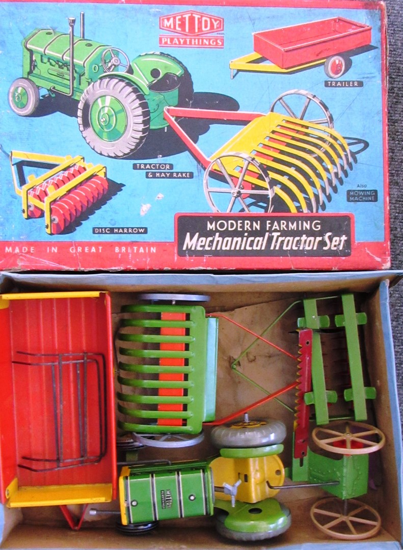 Appraisal: A Mettoy Modern Farming Mechanical Tractor set boxed